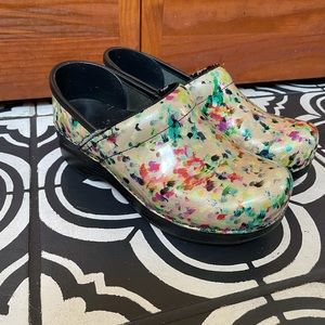 Dansko multi colored patent leather clogs